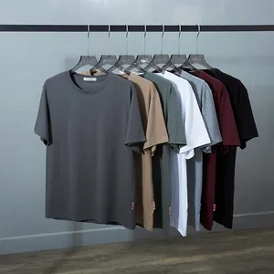 Multiple colors of men's loose fit plain short sleeve cotton T-shirts on a rack