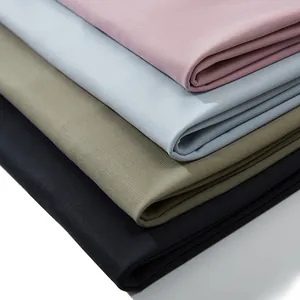 Stack of colorful high-quality cotton blend t-shirts in pastel and dark tones