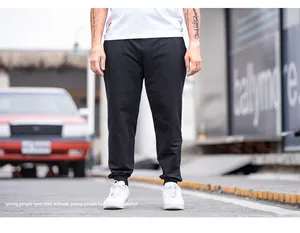 High quality plus size men's black joggers with elastic waist and cuffed hem detail