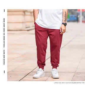 Detailed view of men's plus size maroon joggers with elasticated cuffs for a comfortable fit.