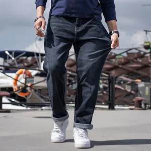 Premium men's black business casual straight-leg jeans featuring a loose and comfortable fit