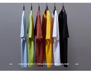 Macro view of men's loose drop shoulder solid color T-shirts in six vibrant colors.