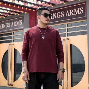 Classic plus size men's solid maroon long sleeve crew neck t-shirt for casual daily wear