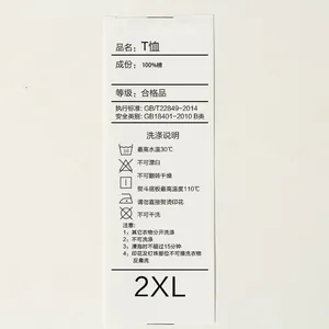 Macro view of the 100% cotton T-shirt wash care tag with laundry instructions