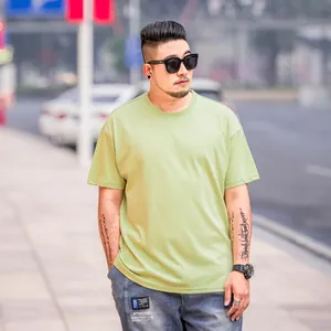 Men's plus size loose fit drop shoulder solid color short sleeve t-shirt in light green