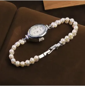 Orologio da donna con bracciale di perle, quadrante ovale argento e design di lusso
