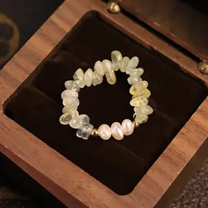 Handmade elegant natural pearl and prehnite stone ring presented in a vintage wooden box