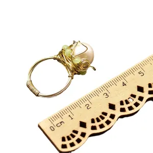 Elegant handmade gold wire wrapped ring with a large natural baroque freshwater pearl