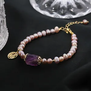 Elegant natural purple freshwater pearl bracelet featuring amethyst and gold Fu charm
