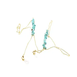 Retro gold metal eyewear chain featuring irregular turquoise stone chips for glasses.