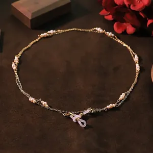 Elegante dubbellaagse brillenketting en halsketting met natuurlijke parels voor dames