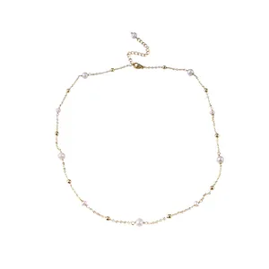 Elegant gypsophila necklace with natural freshwater pearls and gold beads on white