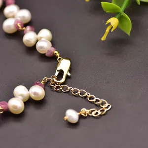 Handmade natural pink tourmaline and freshwater pearl necklace with 18K gold clasp detail