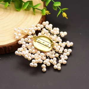 Detailed back view of a handcrafted natural freshwater pearl flower brooch with gold pin