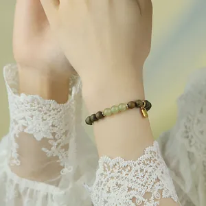 Handmade sandalwood and Hetian jade beaded bracelet in vintage New Chinese style