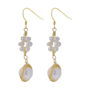 Handcrafted 18K gold-plated natural pearl drop earrings featuring a unique wire-wrapped design