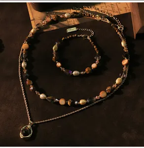 Conjunto de joyas vintage de ojo de tigre y perlas con collar de capas y pulsera