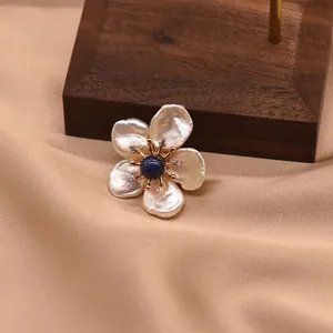 Elegant natural freshwater pearl flower brooch with blue lapis lazuli center for women