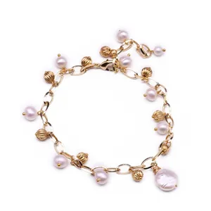 Elegant handmade gold chain bracelet with natural freshwater pearls and fluted beads