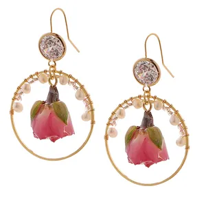 Retro gold hoop earrings featuring natural pearls and pink eternal rosebud floral drops