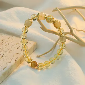 Elegant yellow citrine beaded bracelet with gold accents in New Chinese style