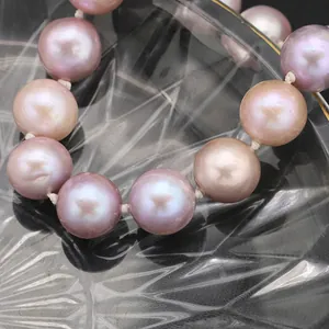 Close-up macro shot of natural lavender Edison pearls bracelet with high luster