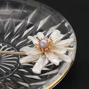 Elegant baroque pearl sunflower hairpin featuring a gold plated stick for traditional styling