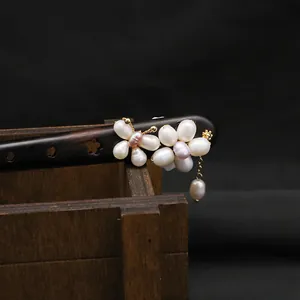 Handmade ebony wood hair stick decorated with natural pearls and elegant floral tassel