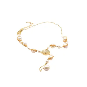 Elegante collana lunga tessuta a mano con perle d'acqua dolce naturali e filigrana
