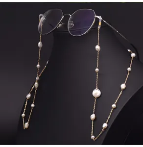 Elegant natural baroque pearl glasses chain for women displayed on a black jewelry mannequin