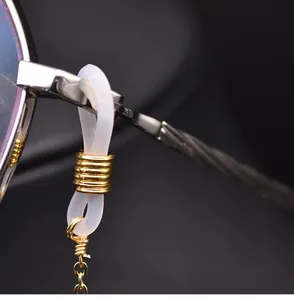 Detailed macro view of anti-slip silicone connector loop for pearl glasses strap chain