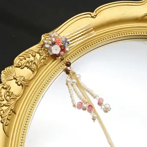 Chinese style hair comb with natural pearls, cloisonné enamel, and elegant tassels