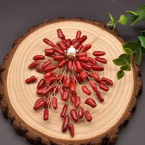 Vintage handmade brooch with natural pearl and red sea bamboo coral branches