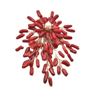 Elegant vintage red sea bamboo branch brooch featuring a central natural white pearl