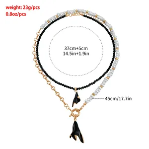 Vue détaillée d'un collier double couche noir et blanc avec dimensions et poids