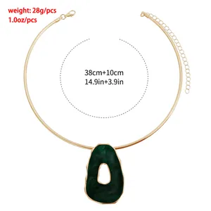 Close-up of vintage green pendant choker showing weight and dimensions info.