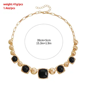 Macro view of vintage geometric gold necklace with 41g weight and 39cm length specifications
