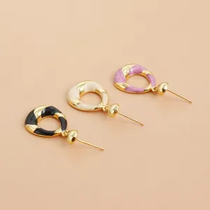 Twisted geometric hoop earrings featuring colorful enamel drip oil design styles