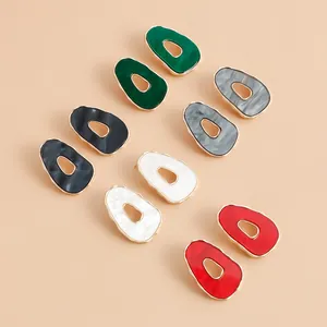 Detailed view of colorful irregular hollowed-out resin stud earrings set