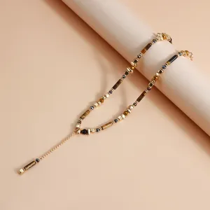 Nahaufnahme einer Vintage Tigerauge-Perlenkette mit elegantem böhmischem Y-förmigem Design