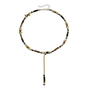 Detaillierte Ansicht der böhmischen Vintage-Y-Halskette mit Tigerauge und Goldperlen