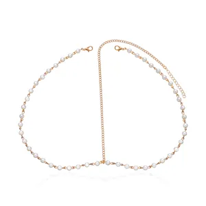Elegant handmade pearl head chain with gold-tone links for bridal or boho hair styling.