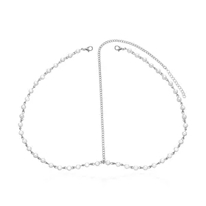 Detailed macro view of elegant handmade white pearl beaded head chain hair band.
