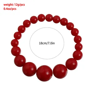 Detail view of red beaded necklace with weight and size specifications.