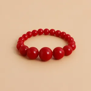 High-quality detail showing the glossy gradient red beads of this fashion necklace