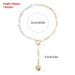Detailed view showing dimensions of a gold heart pendant Y-necklace with clear crystals