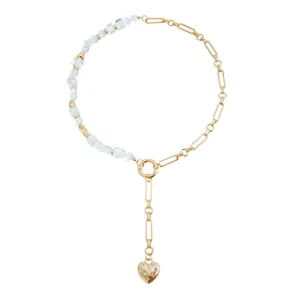 Elegant vintage gold Y-shaped necklace with sparkling heart pendant and clear crystal beads
