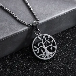 Detail shot of black titanium steel Tree of Life pendant with textured box chain
