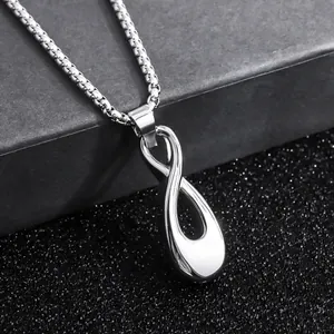 Close-up detail of high-polished stainless steel infinity pendant necklace for men