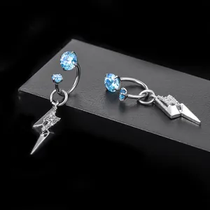 Detail view of titanium alloy lightning bolt earrings featuring blue zircon and clear gems